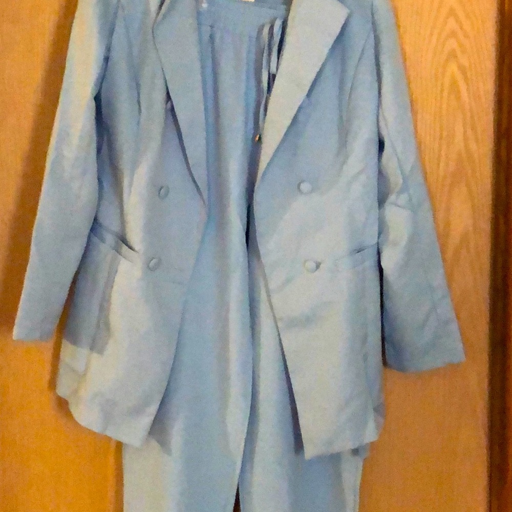 Ladies baby blue new never worn from chi me